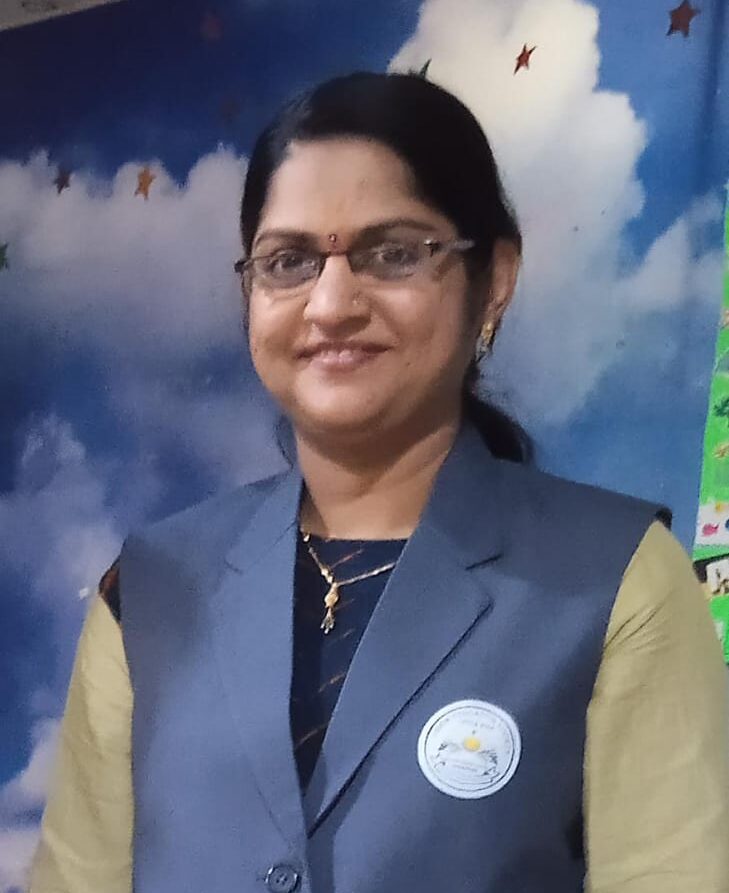 Mrs. Madhuri Amit Shewale, Teacher at Little Star English Medium School, interacting with students in a classroom setting.