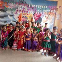 A colorful and engaging banner image for the Pre-Primary section, featuring young children happily participating in playful learning activities at Little Star English Medium School.